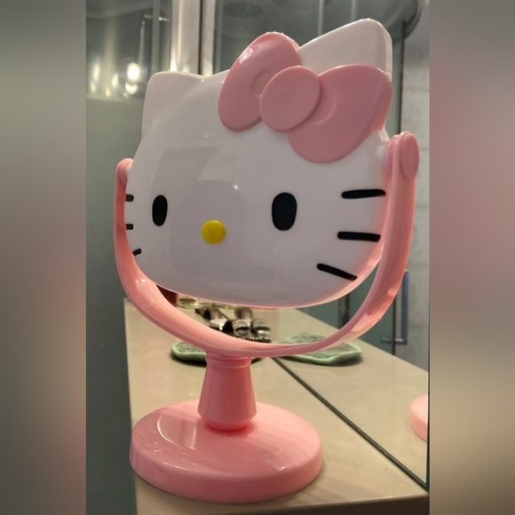 New Hello Kitty pink rotating makeup mirror approximately 8" tall. RED A… - Picture 5 of 5